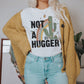 Not A Hugger Sassy Sarcastic Ultra Soft Graphic Tee Unisex Soft Tee T-shirt for Women or Men
